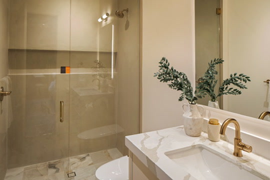 Guest bath with brass fixtures