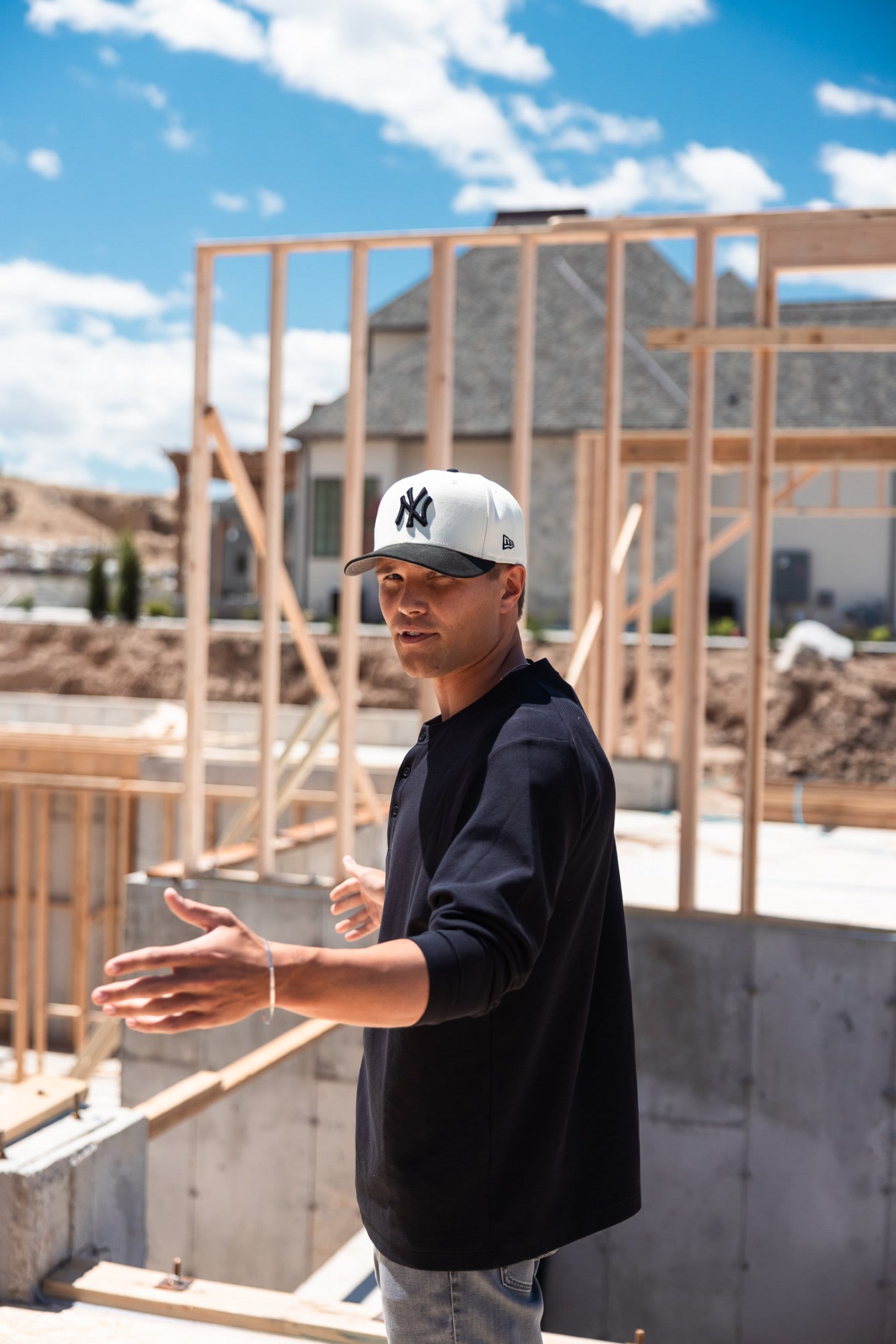 Josh Wilson pointing out framing details on site