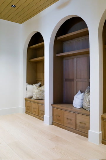 Mudroom with arched benches