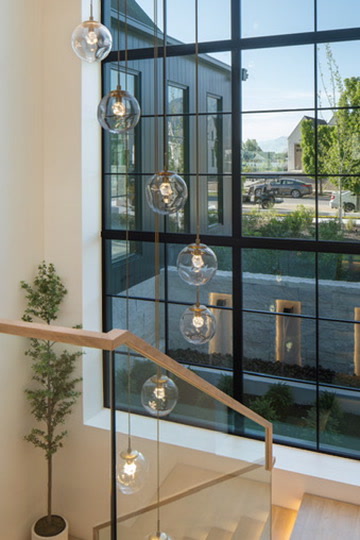 Stairwell with globe pendants